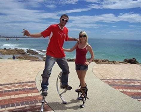 couple with kangaroo stilts